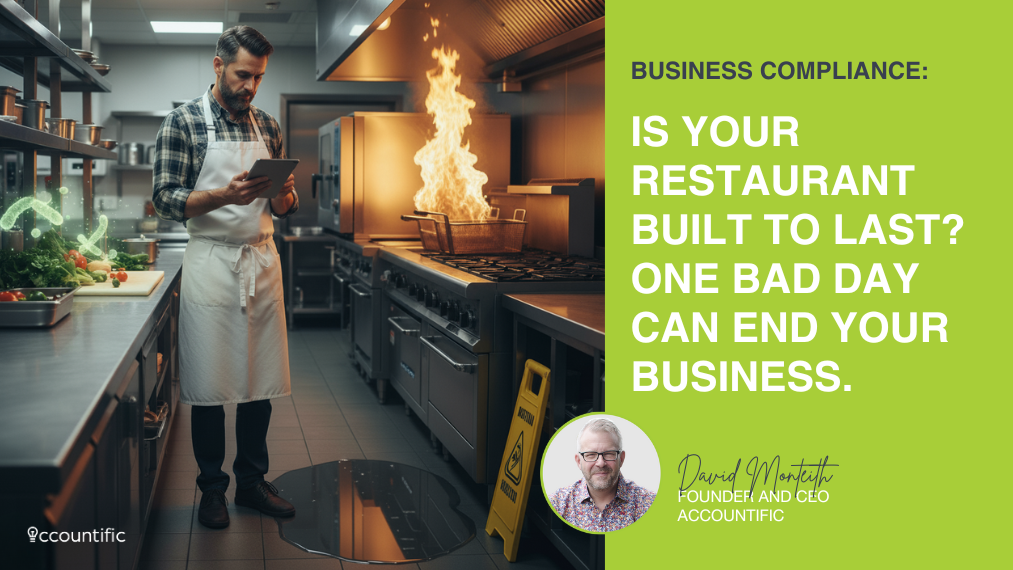 Chef in commercial kitchen with stove fire and wet floor, holding tablet. Business compliance and risk management for restaurants.